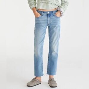 Mid-rise kick flare raw hem jeans